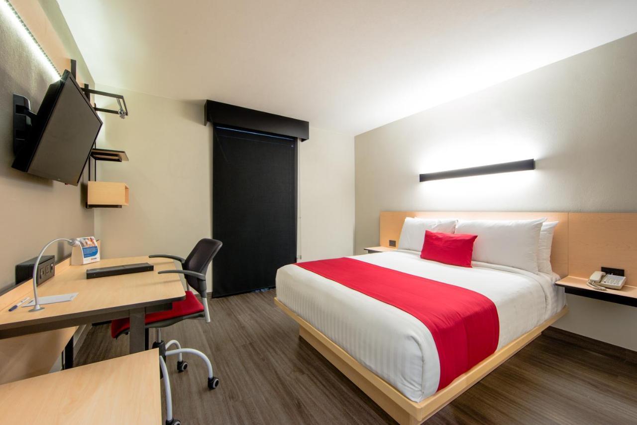 Comfort Inn Delicias Buitenkant foto