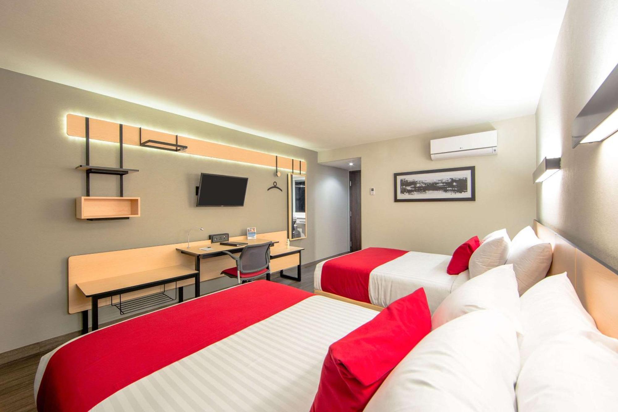 Comfort Inn Delicias Buitenkant foto